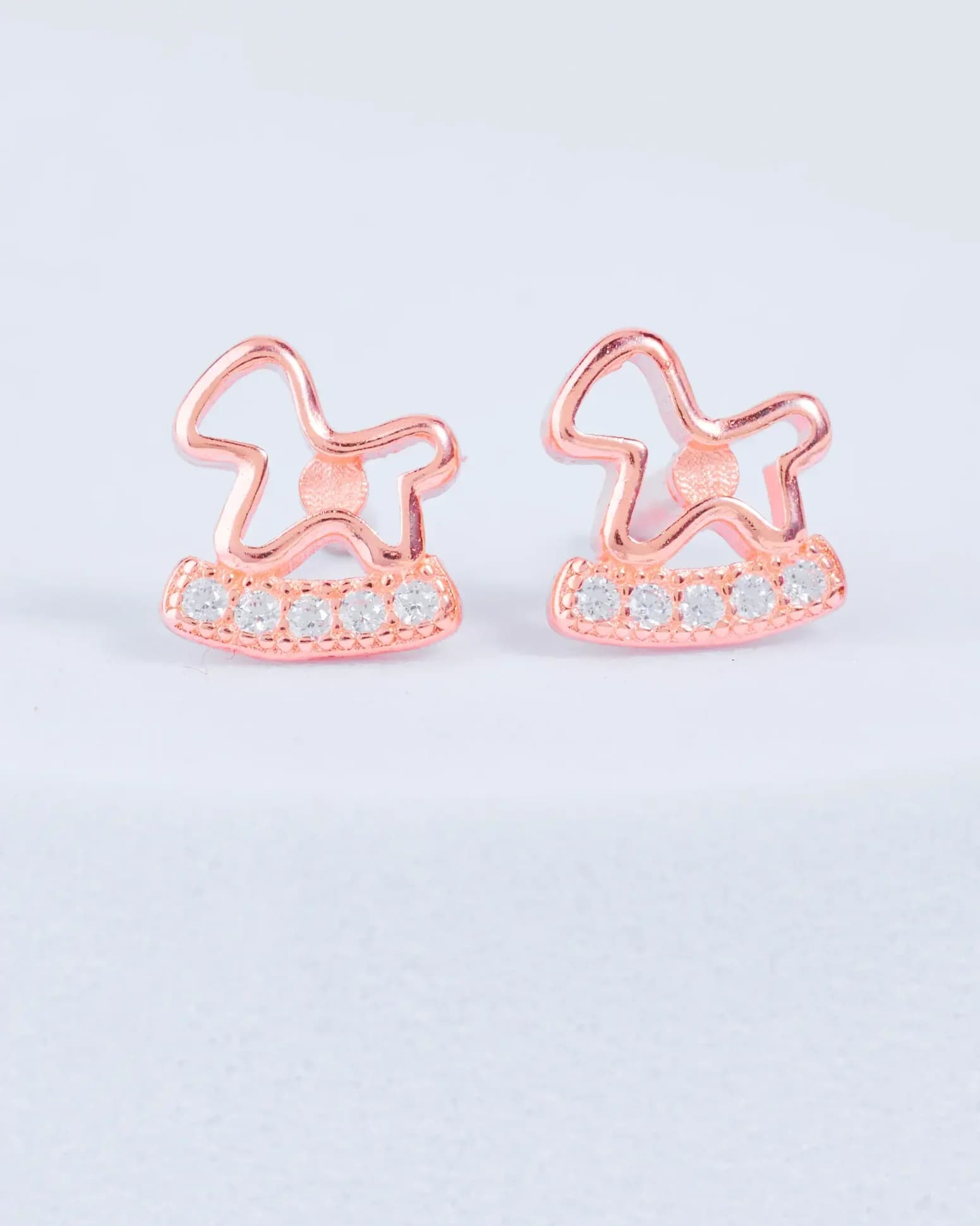 Glimmering Rocking Horse Studs